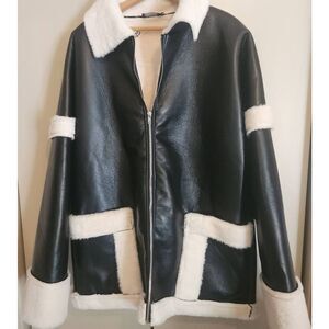 O20 Pretty Little Thing black faux leather coat with soft furry lining